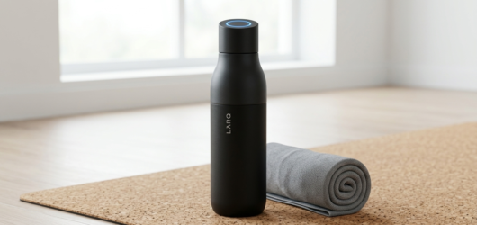 Fitness bottle on yoga mat
